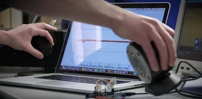 Timothy Trippel demonstrating how sound can influence devices with sounds; screenshot from this youtube video